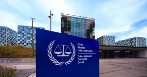 Sede y emblema de la Corte Penal Internacional